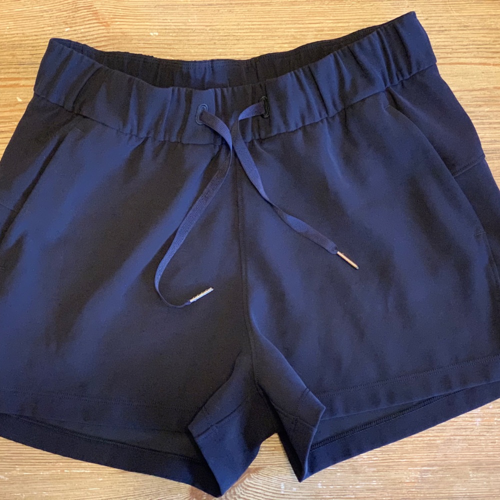 Lululemon, size 4, Black shorts. Pockets draw string.
